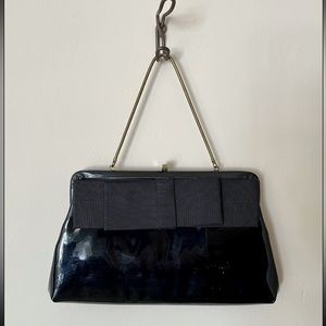 Vintage black patent-leather purse with flat corded-fabric bow (circa 1950s)